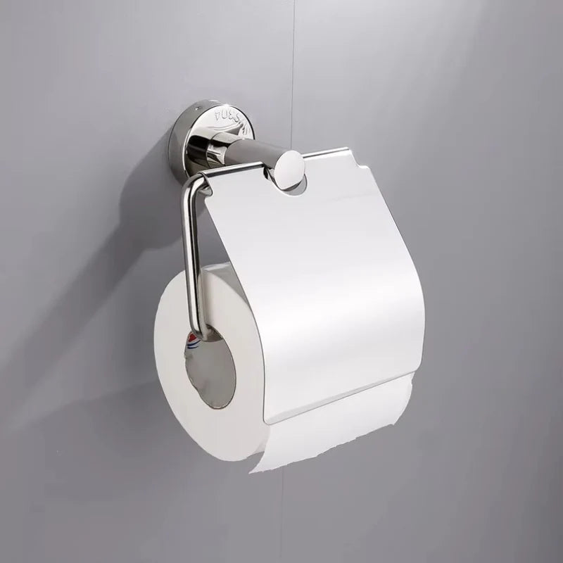 A side-angle product photo of a high-polish silver stainless steel covered toilet paper holder, with a single roll of white toilet paper.
