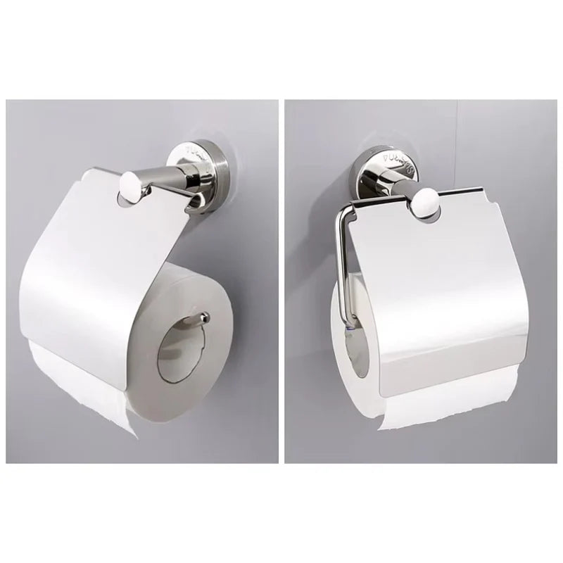 A side-angle product photo of a high-polish silver stainless steel covered toilet paper holder, with a single roll of white toilet paper.