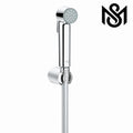 Plastic Muslim Shower Set with wall-mounted holder and multi-hole spray head for bathroom hygiene.