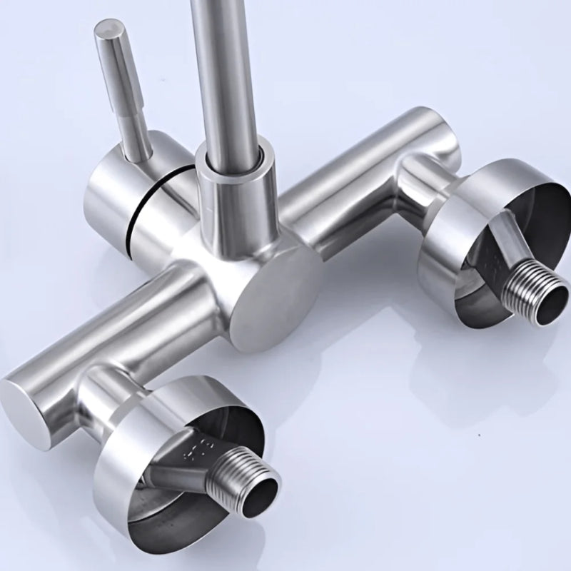 Wall-mounted matte steel kitchen mixer tap with high-arc gooseneck spout for modern sink installations.