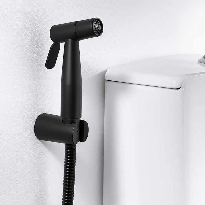 Stainless steel handheld bidet sprayer with trigger handle and flexible metal hose, displayed on a clean white background